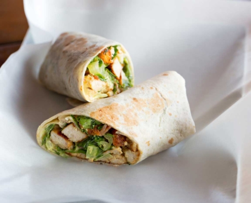 chicken caesar wrap on a napkin